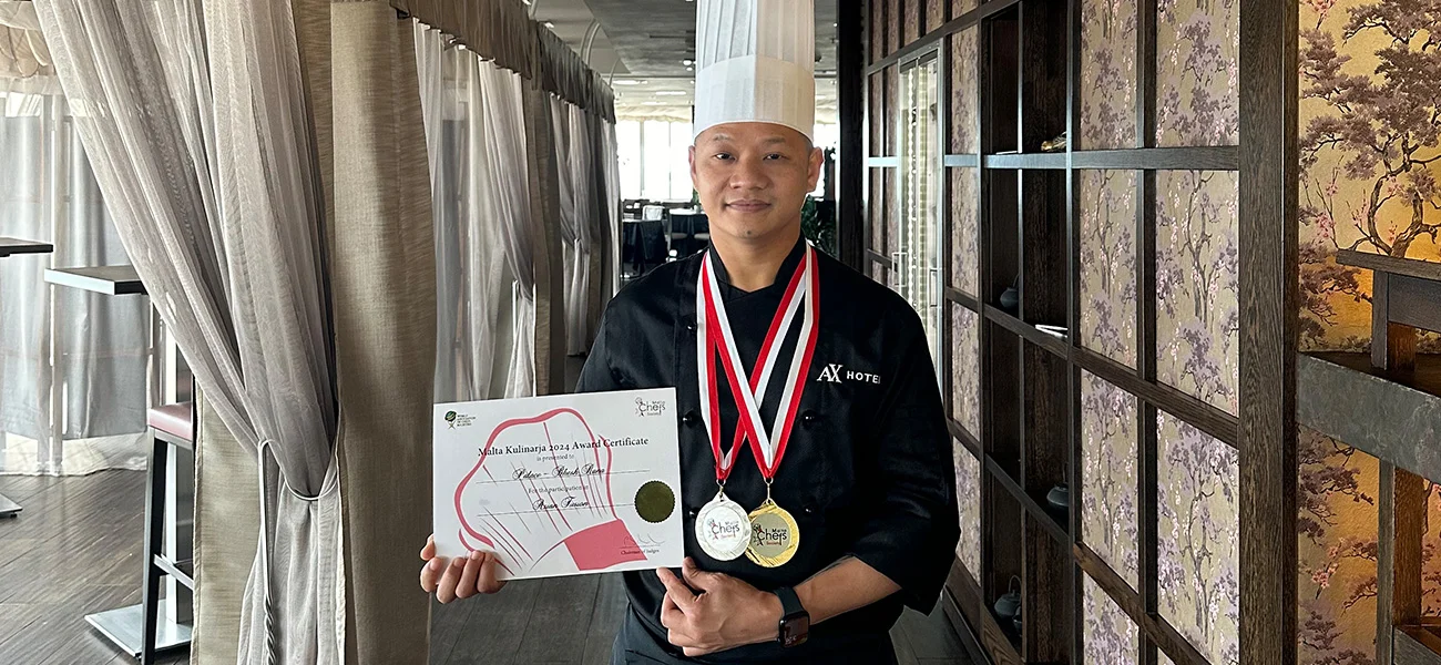 Chef Bhesh Rana showcasing his 2 medal achievements